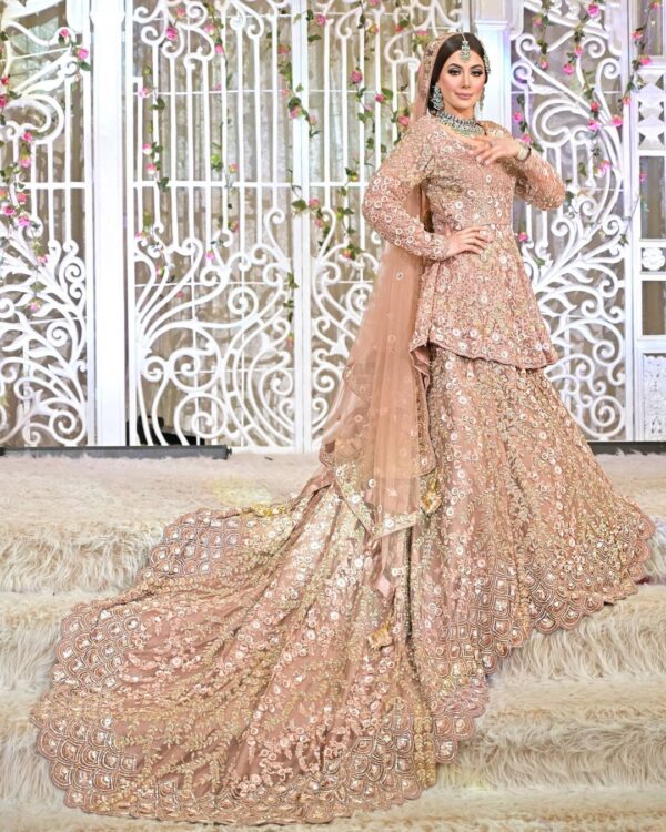 Pakistani wedding peplum with long trail lehenga