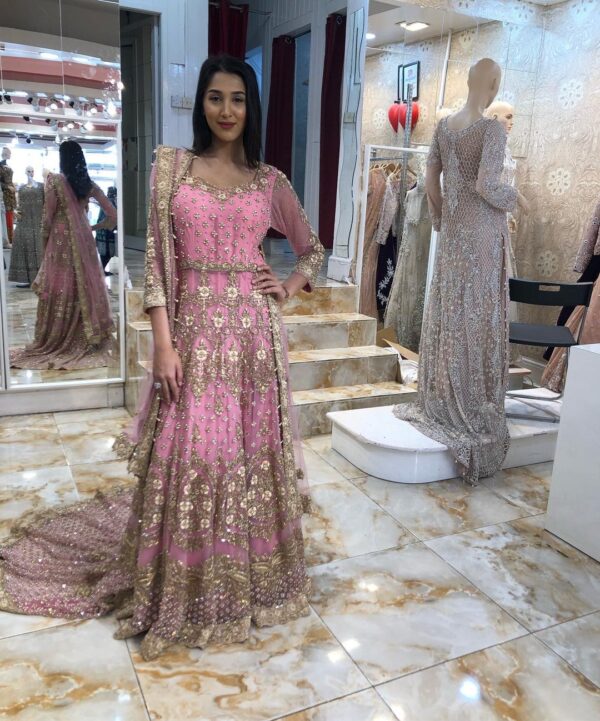 Pakistani wedding long trail gown with handwork