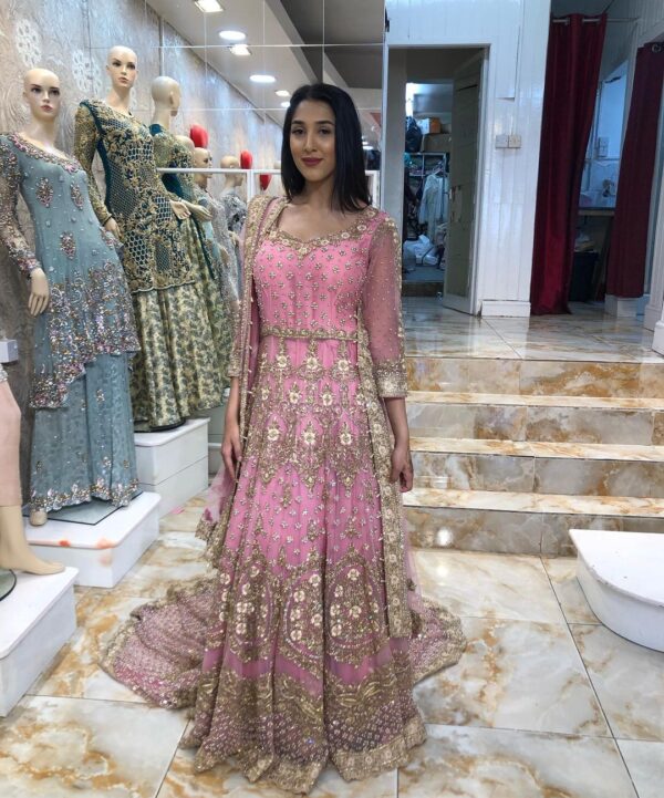 Pakistani wedding long trail gown with handwork