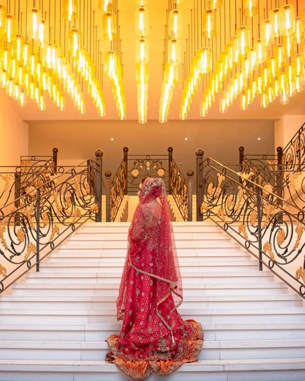 pink split anarkali with long trail lehenga