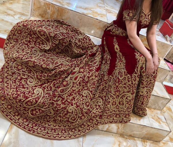 wedding long trail lehenga with handwork