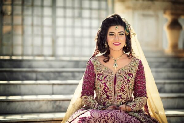 purple designer gown with embroidery