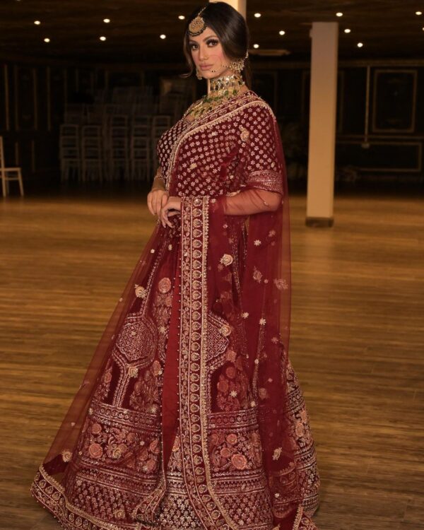 red bridal lehenga with golden embroidery