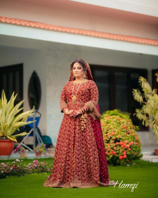 red designer long gown with golden embroidery