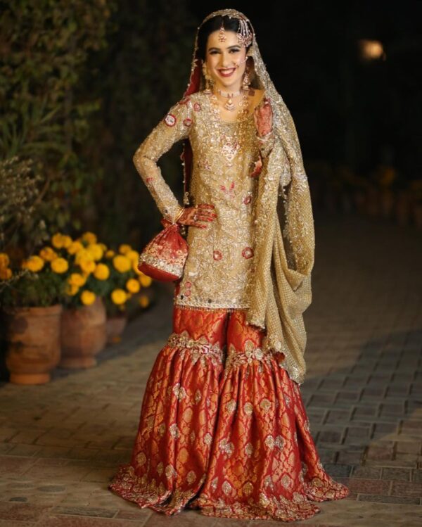 golden kurti with red garara