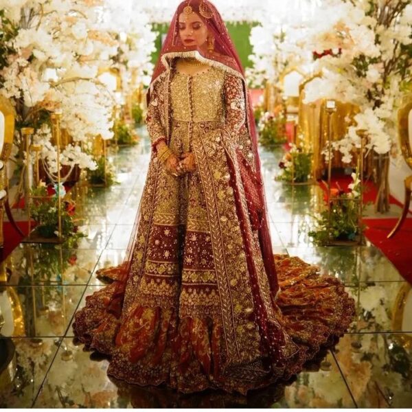 red and golden bridal long trail lehenga with kurti