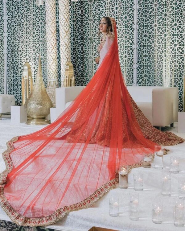 red indian bridal long trail lehenga with crop top