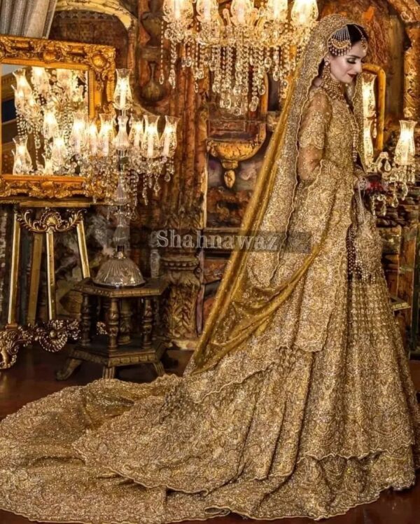 Golden wedding long trail lehenga with peplum