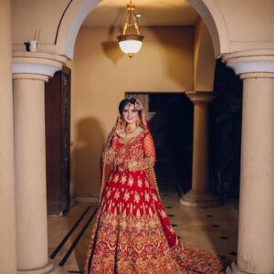 red and golden bridal long trail gown