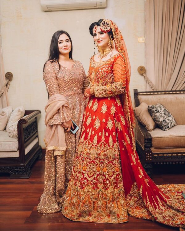 Red and golden bridal long trail gown