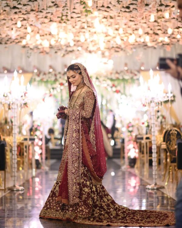 red long trail gown with embroidery