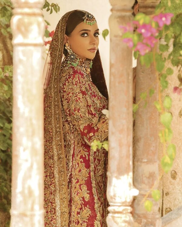 red bridal long trail lehenga with anarkali