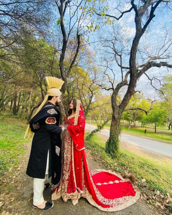 red bridal long trail anarkali with lehenga