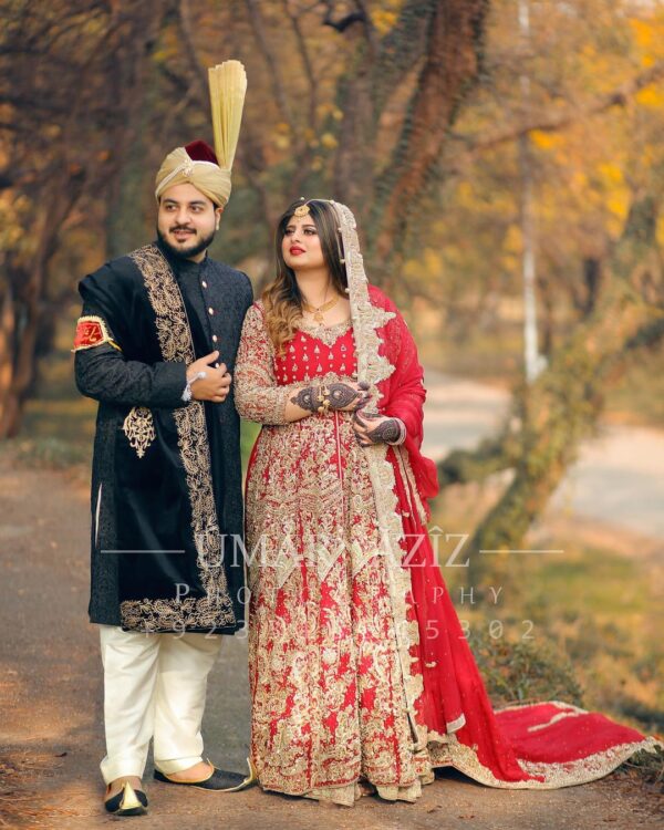 Red bridal long trail anarkali with lehenga