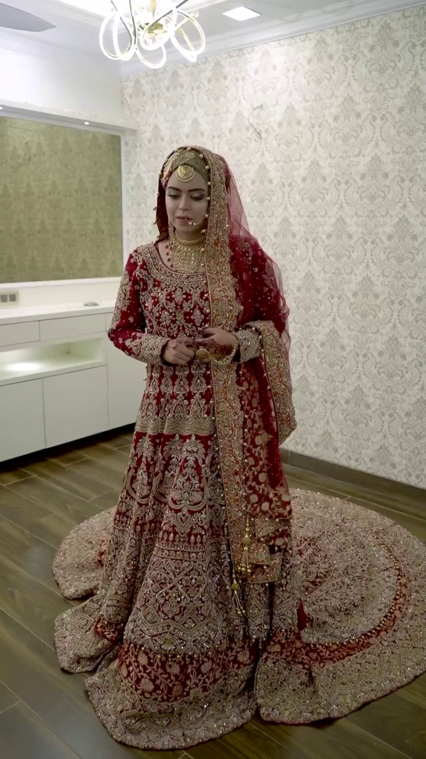 Red bridal long trail gown with handwork
