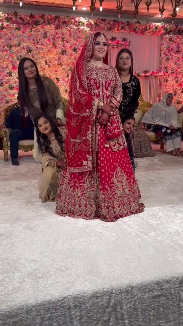 wedding long trail lehenga with handwork