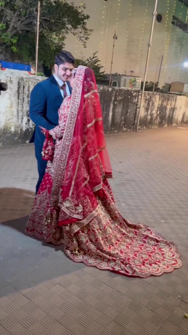 red bridal split jacket with lehenga