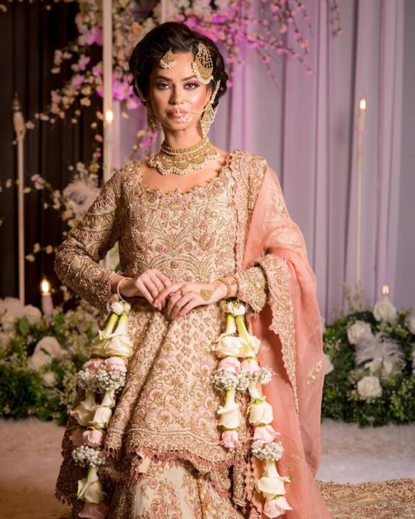 Pakistani waleema long trail lehenga with peplum