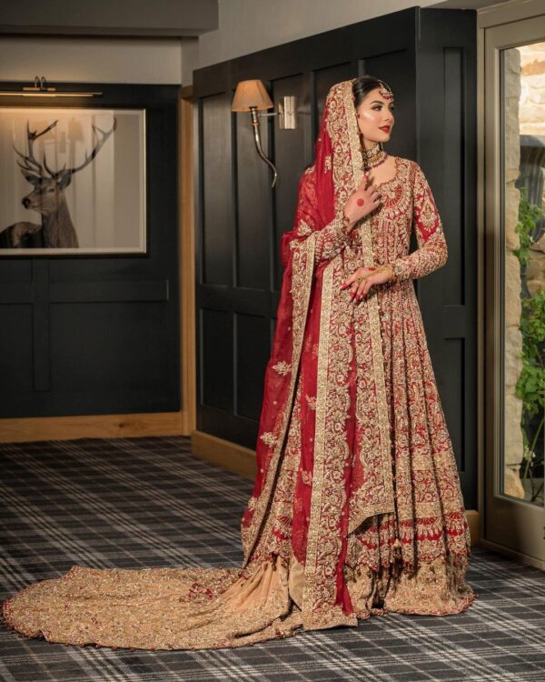 red bridal long trail lehenga with anarkali