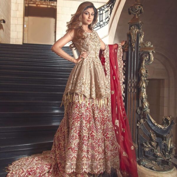 Pakistani bridal long trail lehenga with peplum
