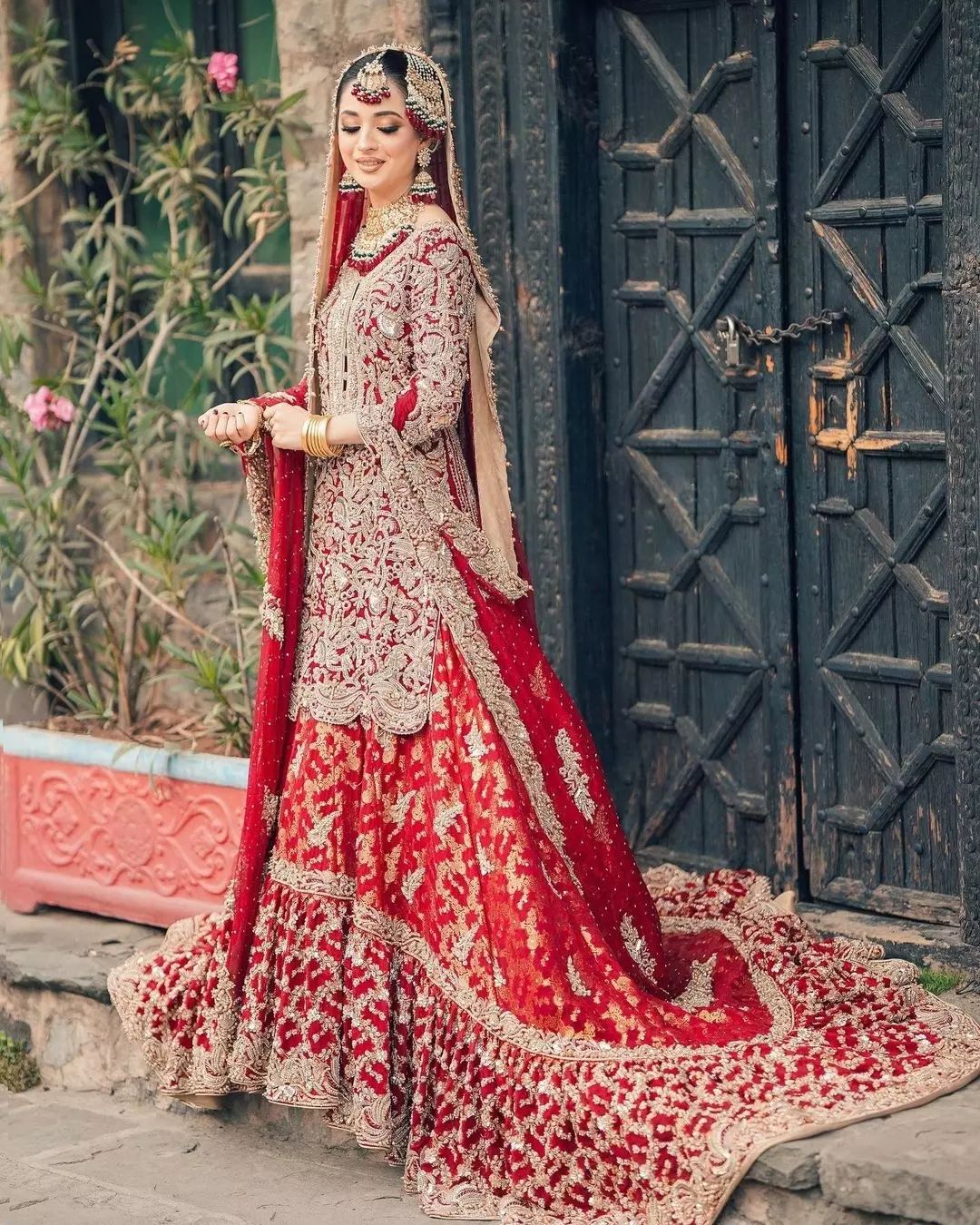 Red Designer Pakistani Bridal Long Trail Lehenga with Embroidered Kameez 