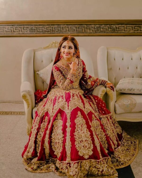 red bridal lehenga with golden embroidery