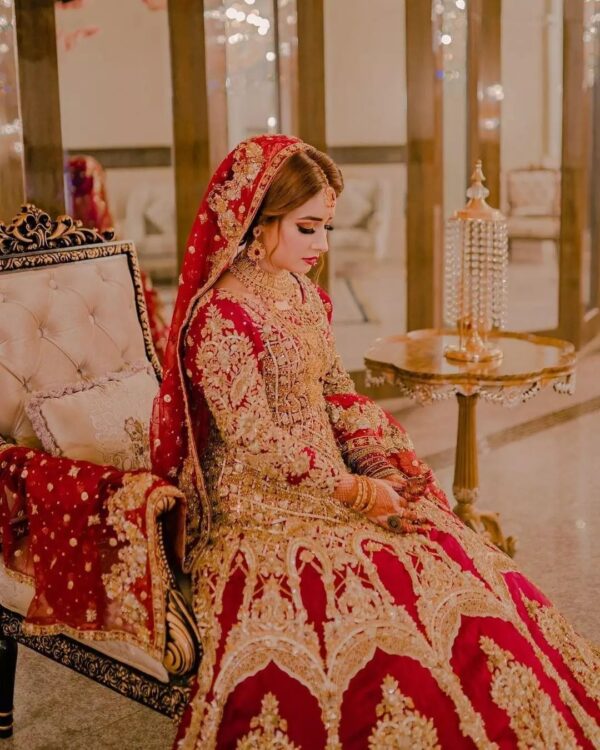 red bridal lehenga with golden embroidery