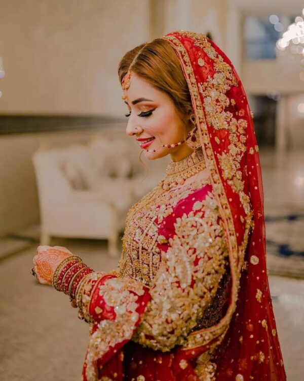 red bridal lehenga with embroidery