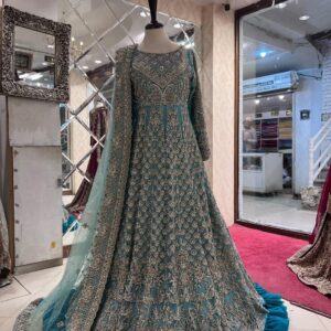 Blue designer gown with embroidery