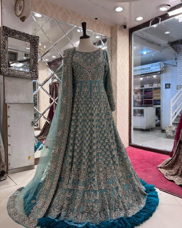 Blue designer gown with embroidery