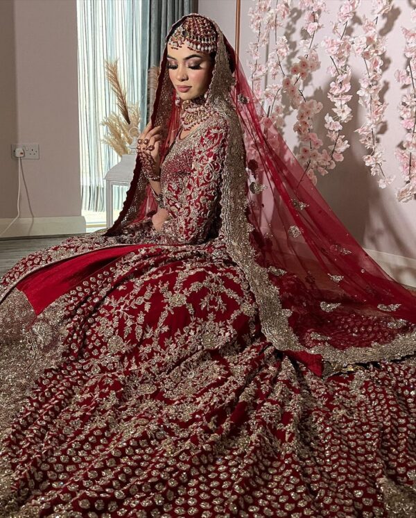 Designer red bridal long trail lehenga with kurti