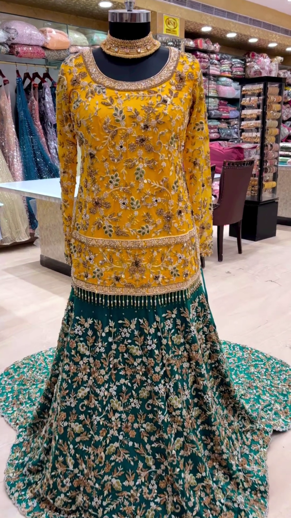 wedding long trail lehenga with handwork