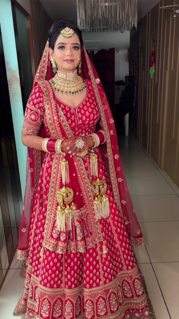 red bridal lehenga choli with handwork