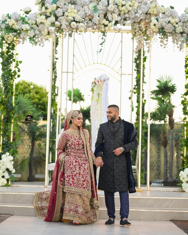 wedding long trail lehenga with handwork