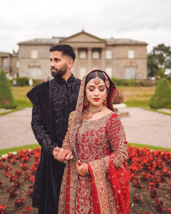 designer wedding long trail lehenga with handwork