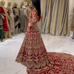 Red bridal long trail gown with handwork