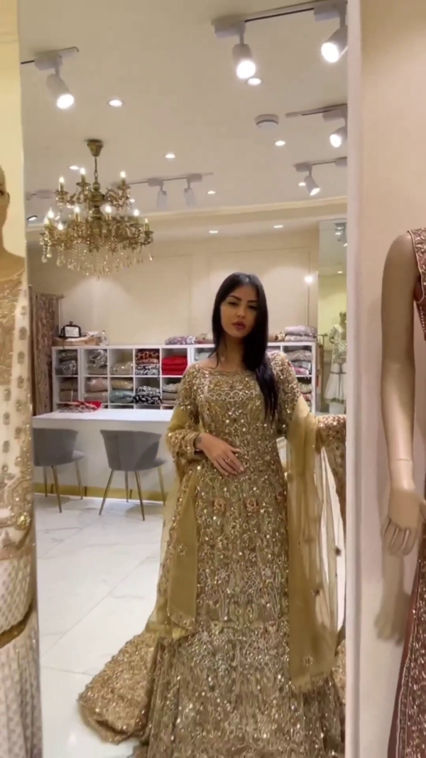 Golden designer wedding long trail lehenga with kurti