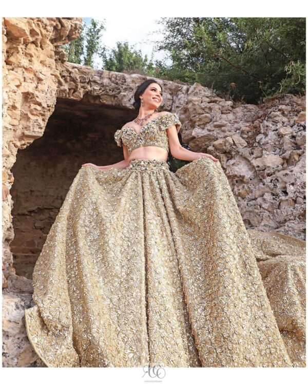 designer golden long trail lehenga