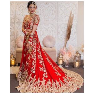 red bridal long trail lehenga with crop top