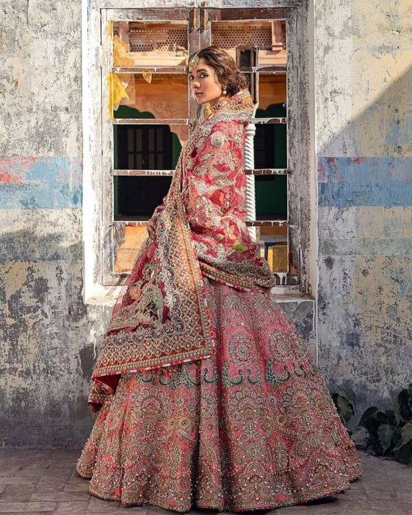Peach designer wedding lehenga with blouse and embroidery