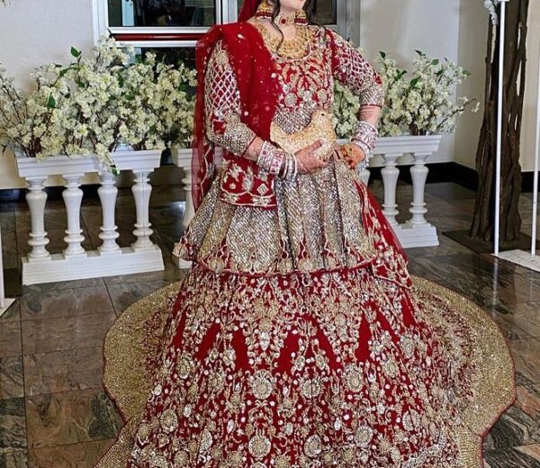 red designer bridal long trail lehenga with peplum
