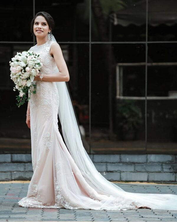 designer long trail gown with embroidery
