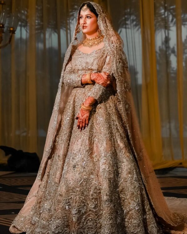 Pakistani designer long veil lehenga with embroidered blouse