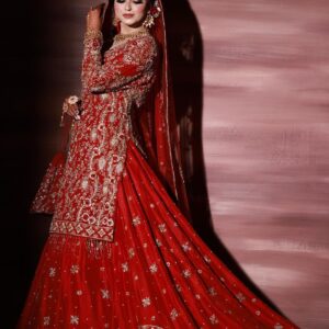 red embroidered kameez with lehenga