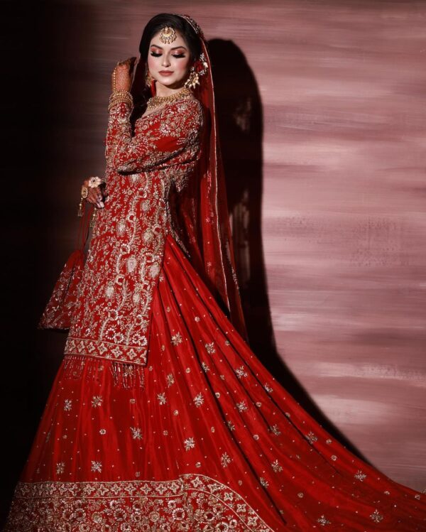 red embroidered kameez with lehenga