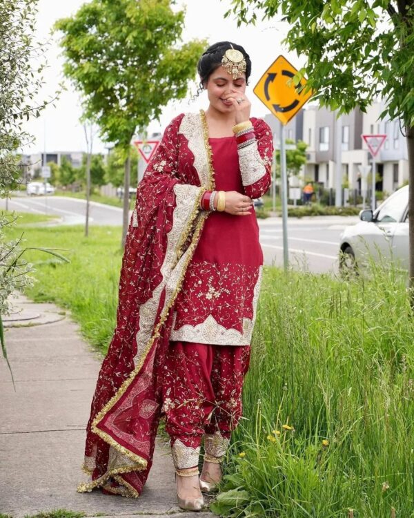 Red Punjabi wedding suit with embroidery