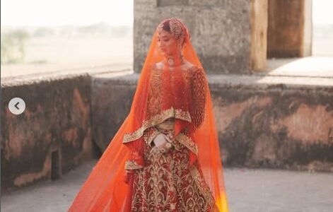 Red Bridal Lehenga with Long Trail – A Regal Look