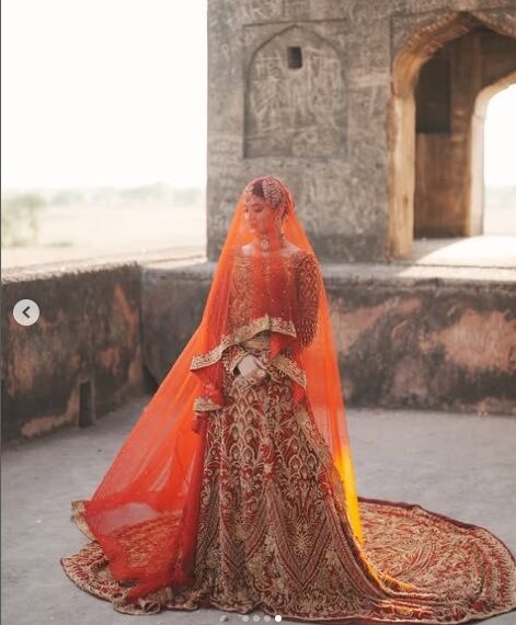 Red Bridal Lehenga with Long Trail – A Regal Look