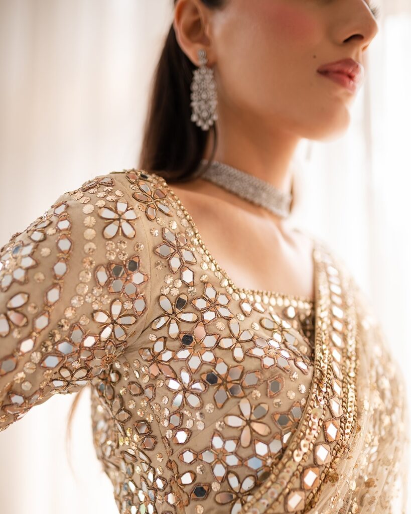 Designer blouse
Golden reception sari