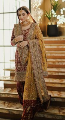 Maroon bridal handwork sharara suit with yellow Maroon bridal handwork sharara suit with yellow